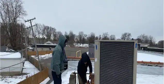 Rooftop HVAC service in winter